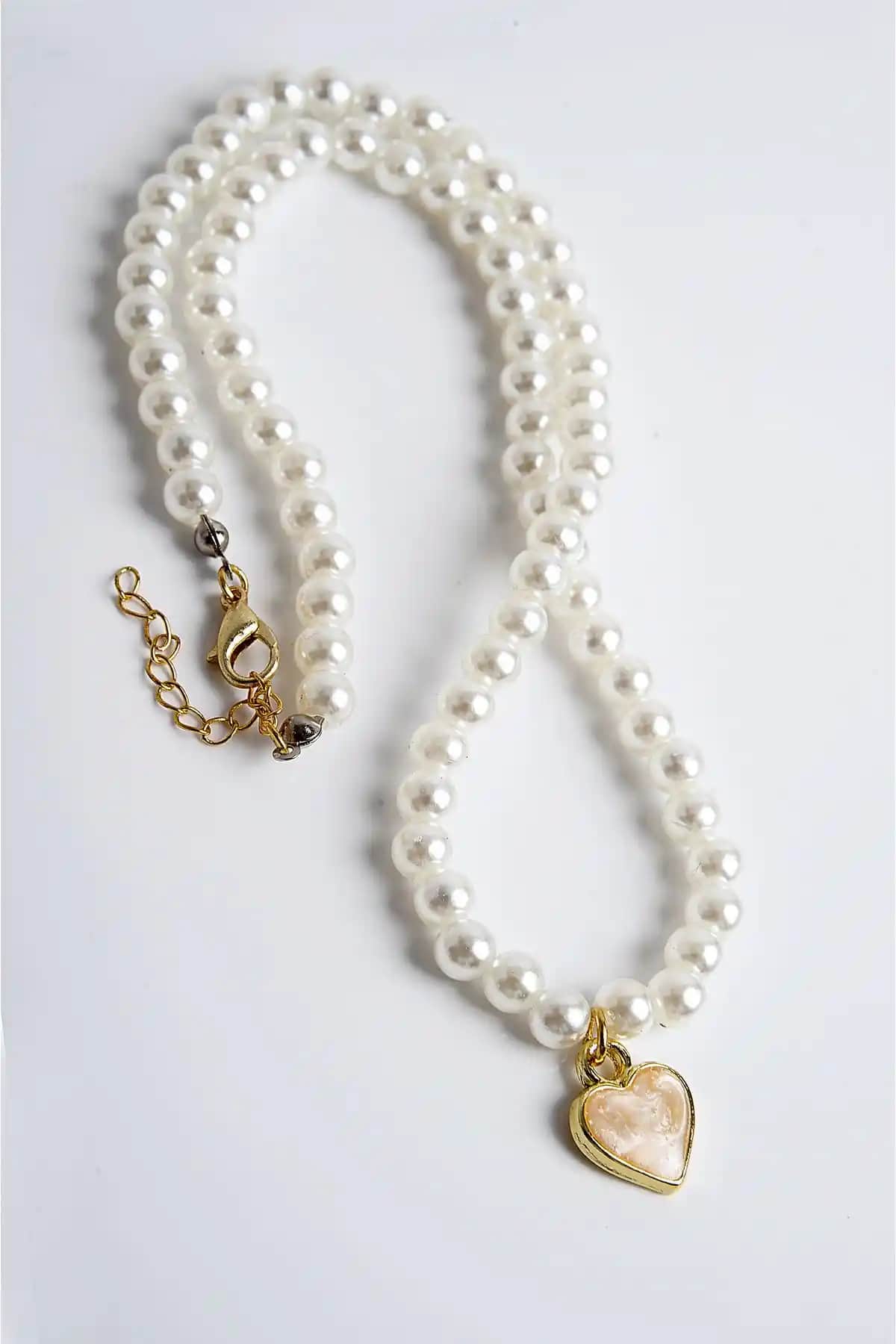 EUROMODA İncili Sedefli Kalp Tasarımlı Gold Renkli Kolye Özellikleri ve Kullanım İpuçları