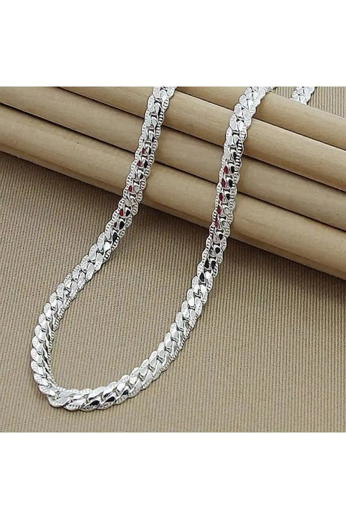 Gümüş Takı Karşılaştırması: Canaygun Unisex Kolye ve Milenyum Balık Sırtı Modeli