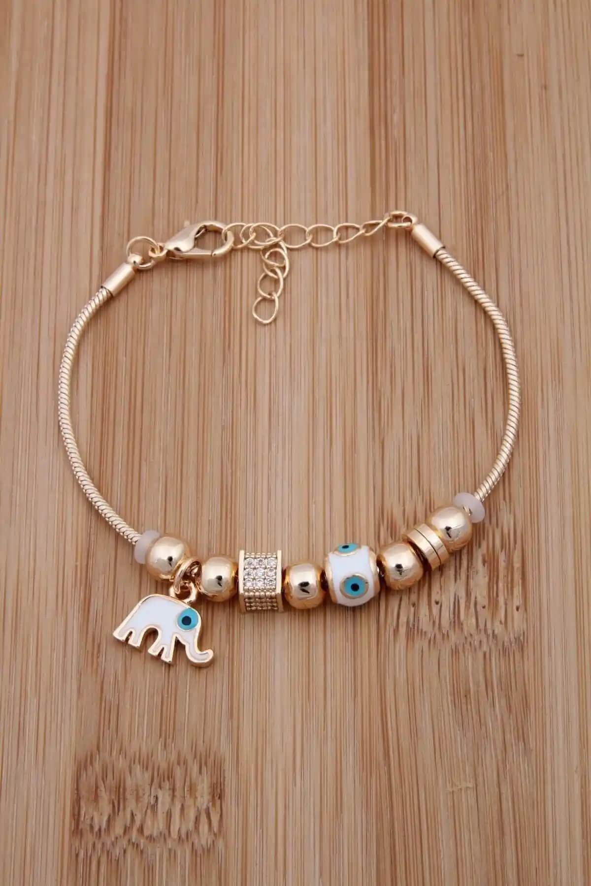 Jack Ferrero ve Jenny Daphne Nazar Boncuklu Zirkon Taşlı Fil Figürlü Gold Bileklik Karşılaştırması