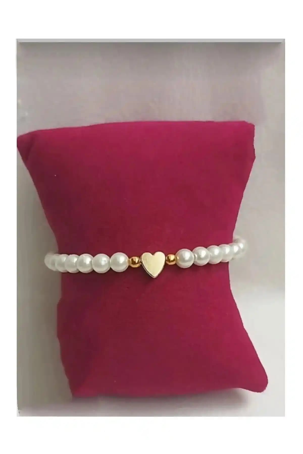 Monalisa Toka Kadın Incili Kalp Bileklik: Zarif ve Şık Tasarımın Modern Yansıması