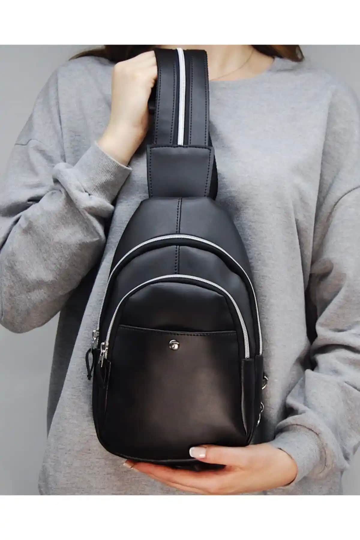 D'VERS Modawest ve RELIANCE Siyah Çanta Karşılaştırması: Hangi Model Sizin İçin Uygun