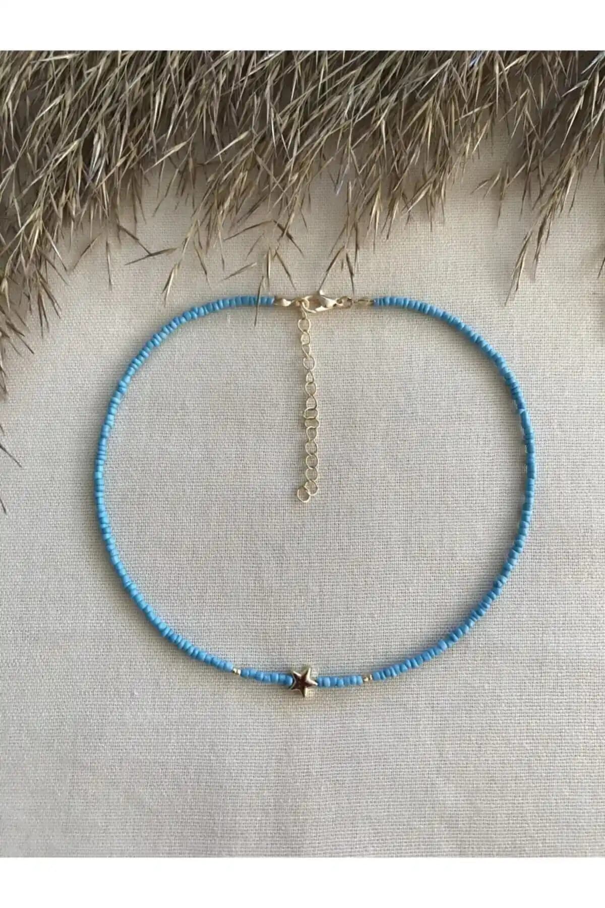 Esen Aksesuar Mavi Boncuklu Gold Yıldız Uçlu Kolye - Şık ve Dayanıklı Tasarım