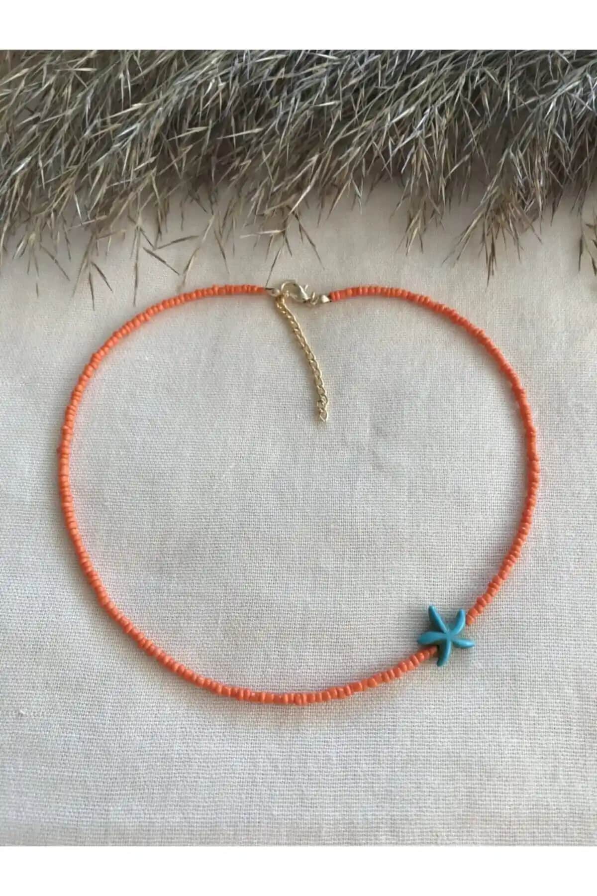 Fullcontrol Turuncu Boncuk ve Mavi Deniz Yıldızı Uçlu Kolye: Renkli ve Şık Tasarım