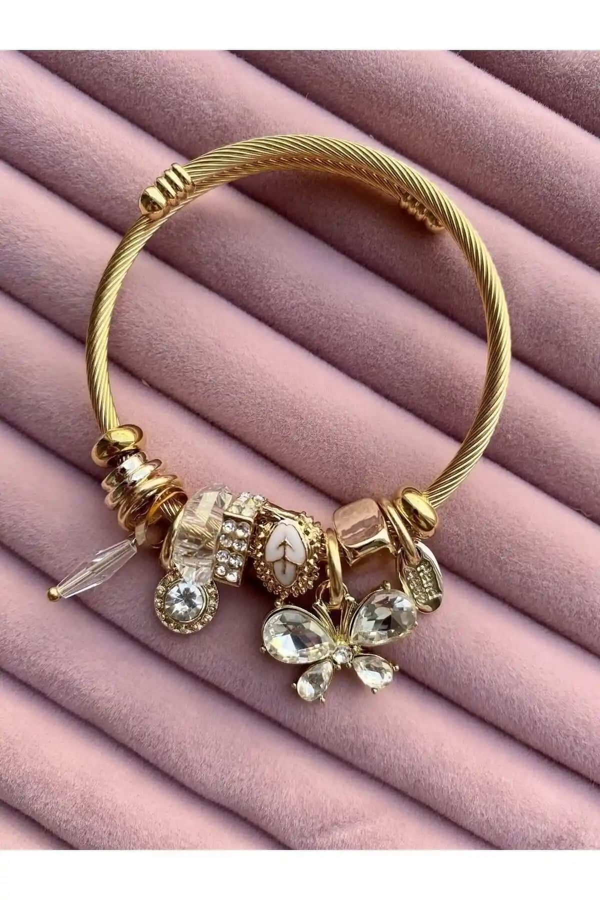 İki Çelik Charm Bileklik Karşılaştırması: Tasarım, Kalite ve Kullanıcı Yorumları