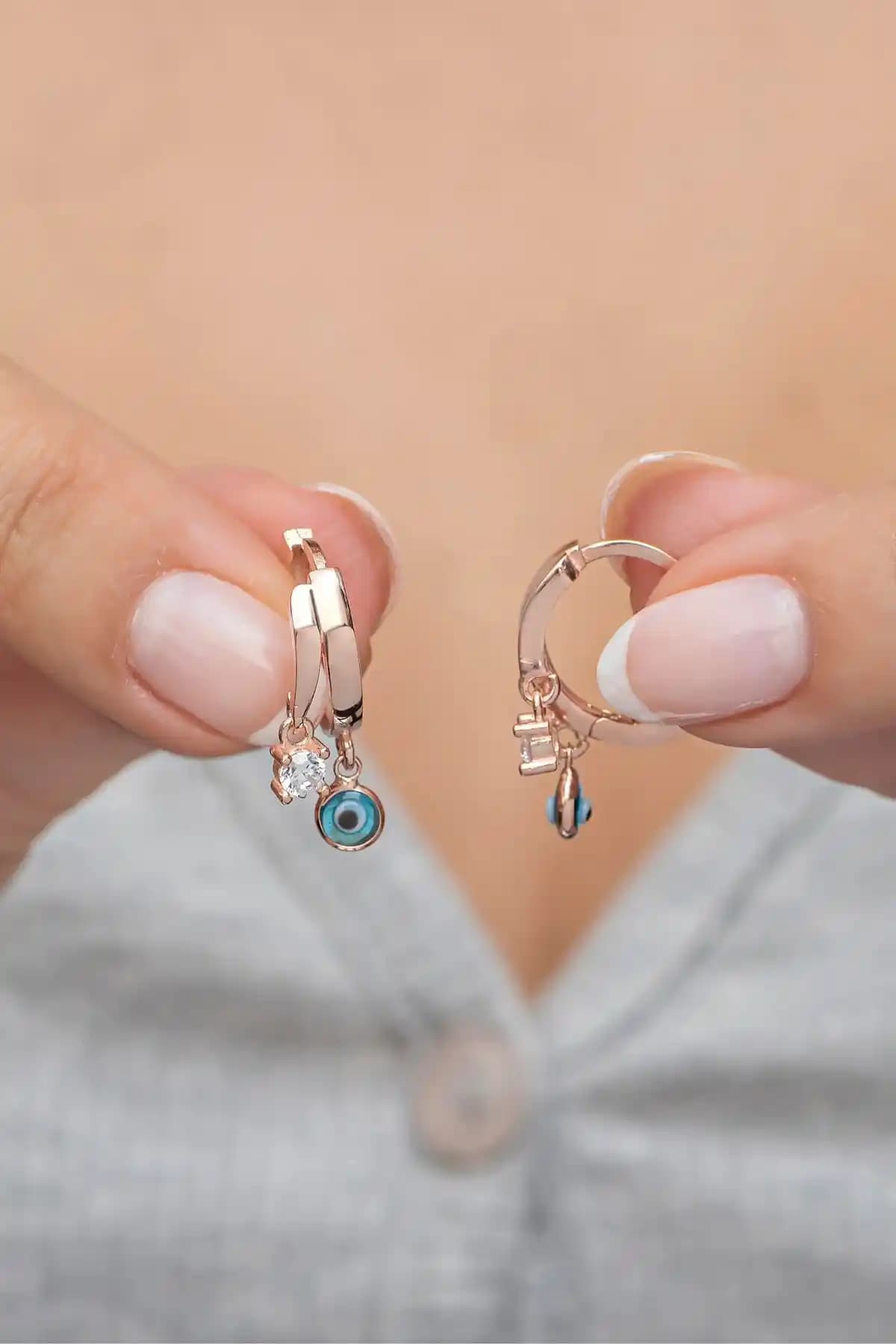 NEREZE Gümüş Küpe Karşılaştırması: Nazar Göz ve Mistik Topaz Modelleri