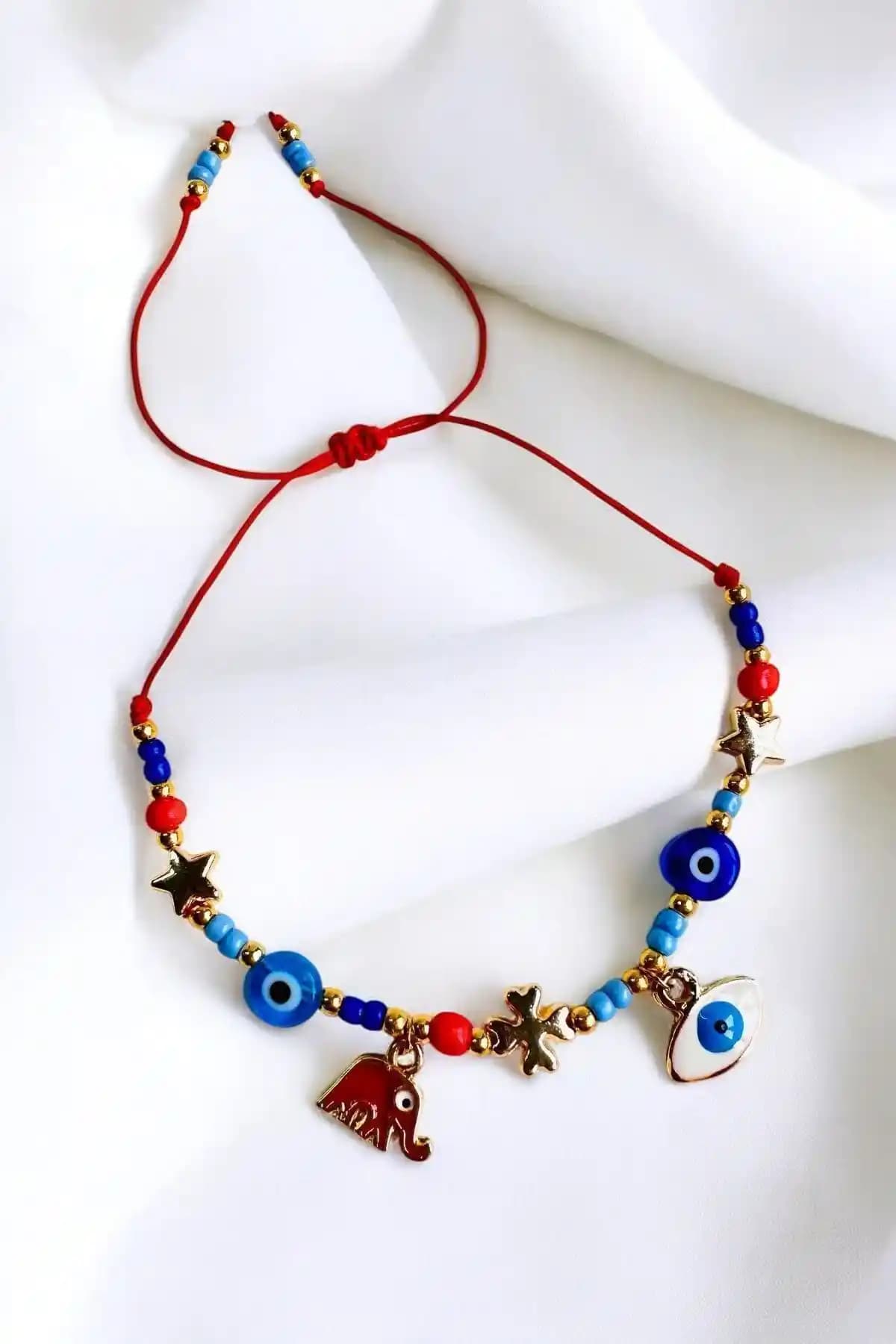 PETEK AKSESUAR tarafından tasarlanan canlı kırmızı boncuk ve kristal taş detaylı el yapımı halhal