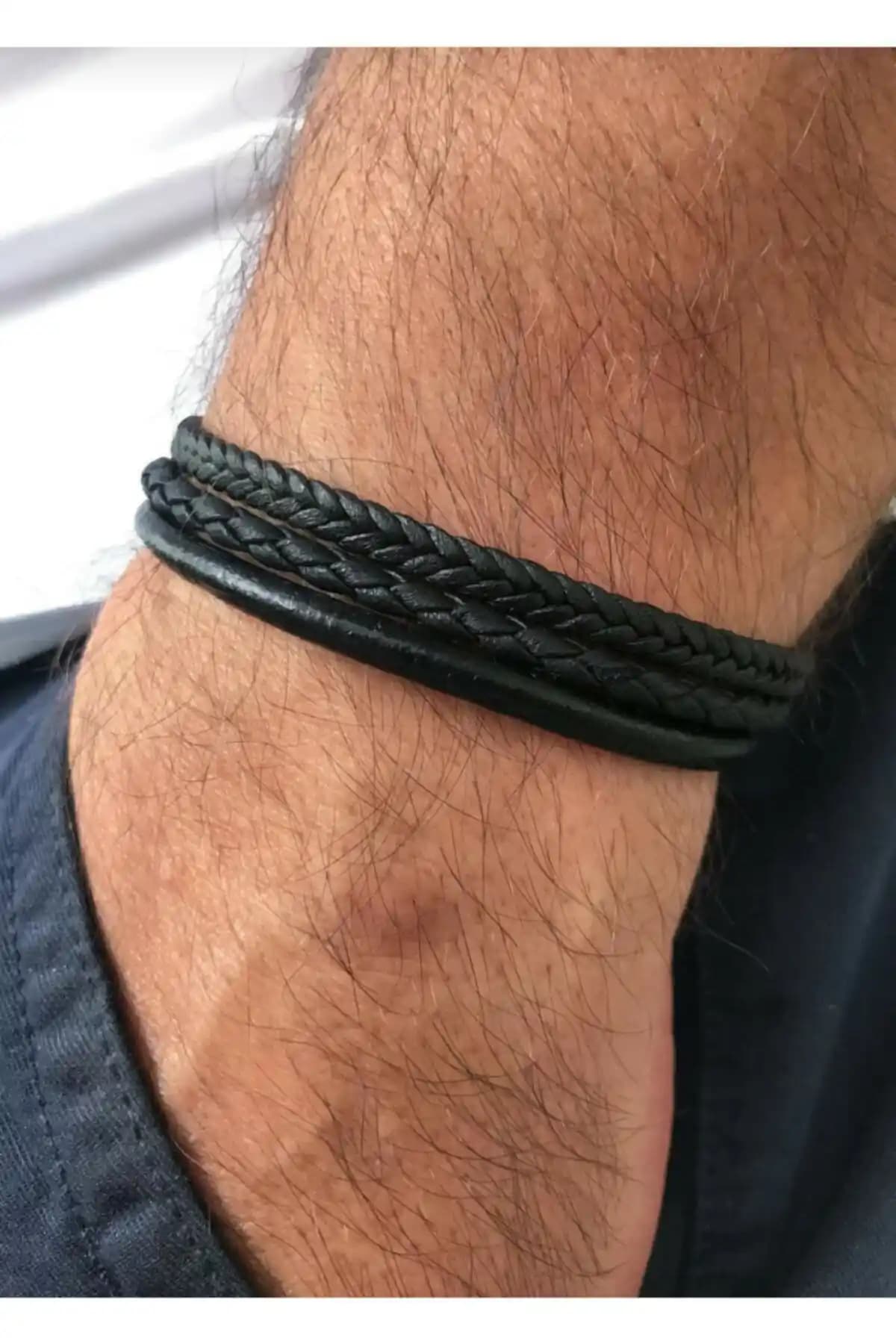 Reggente Siyah Örgü Deri Bileklik: Modern ve Zarif Tasarım ile Şıklığınızı Tamamlayın