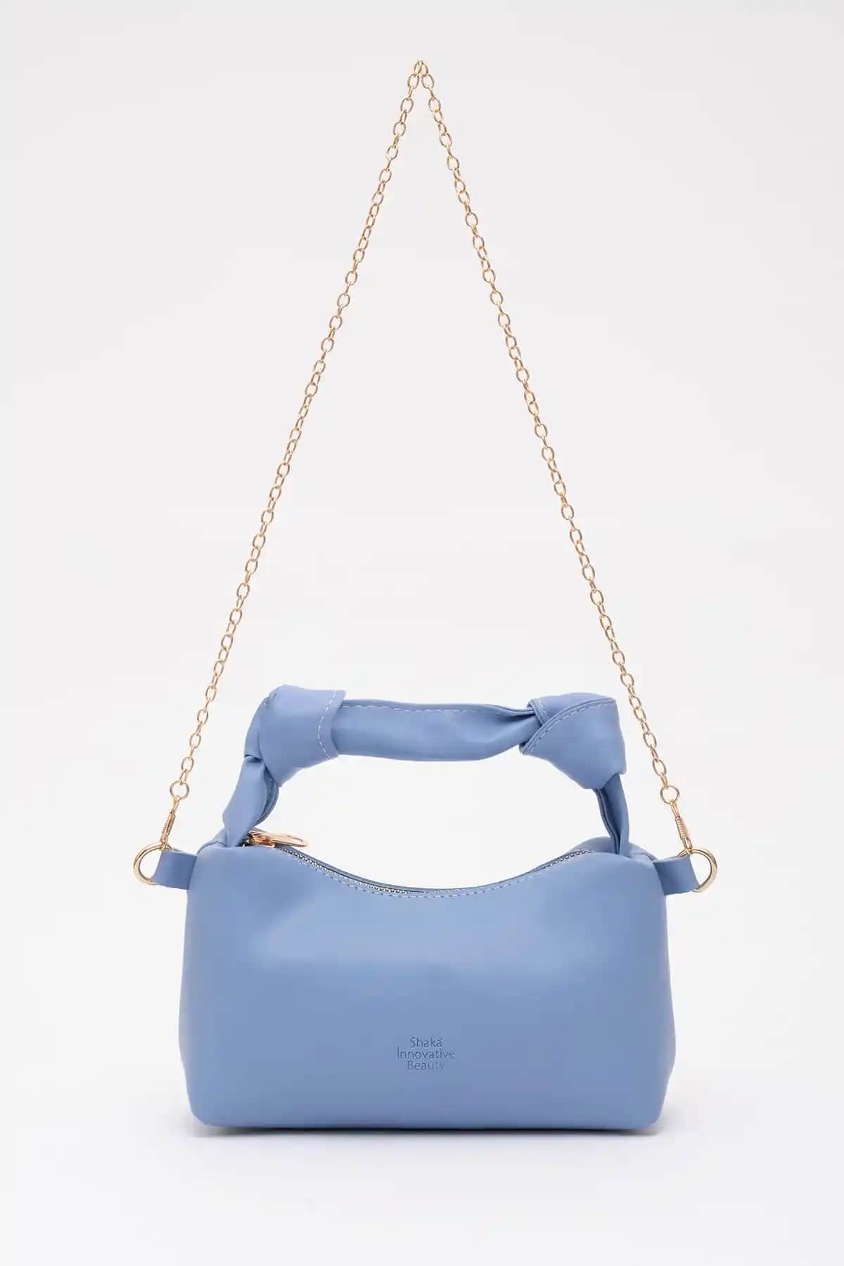 Şaka Marka Mavi Deri Çanta: Günlük ve Özel Günler İçin Şık ve Kullanışlı Tasarım