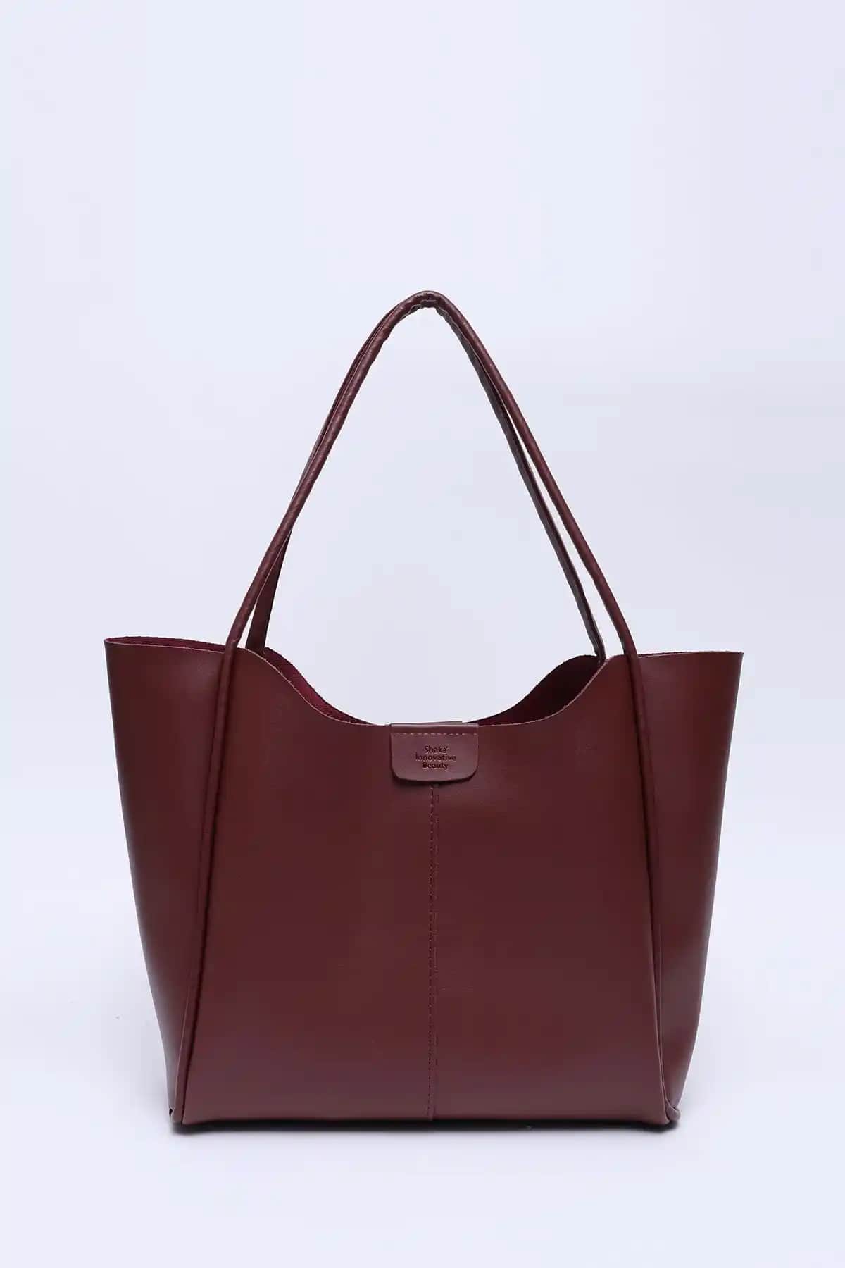 Shaka Bordo Suni Deri Çıtçıtlı Makaj Çantası Estetik ve Fonksiyonellik Bir Arada