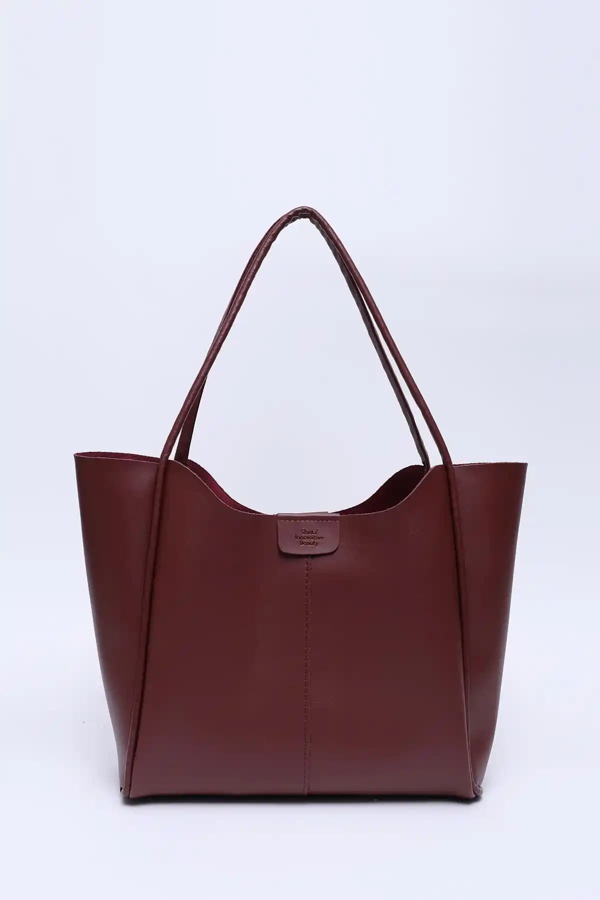 Shaka Bordo Suni Deri Çıtçıtlı Makaj Çantası Estetik ve Fonksiyonellik Bir Arada