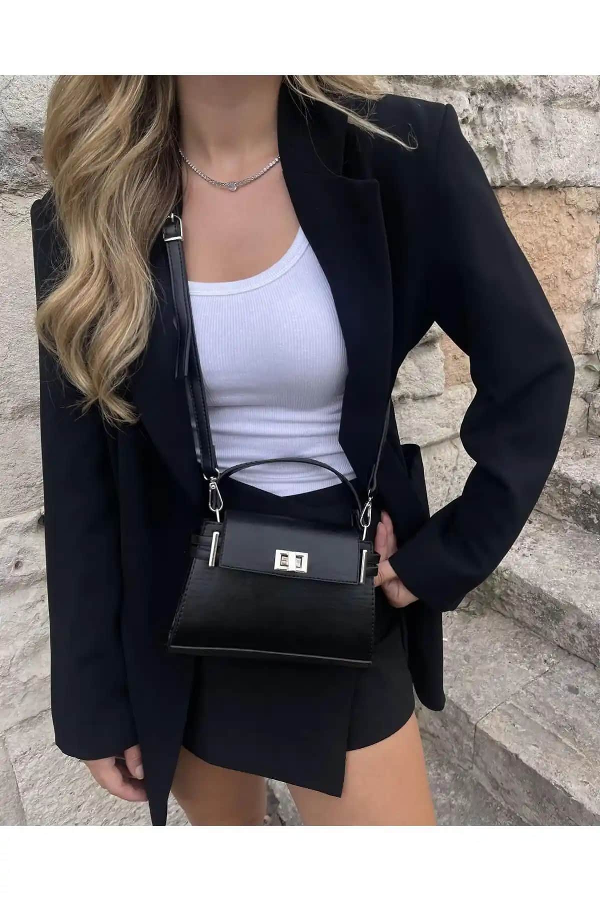 Tina Siyah Kilit Kapaklı Kol Çantası: Modern, Dayanıklı ve Kullanışlı Günlük Aksesuar